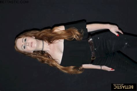 Stunning Chick Gets Naked And Poses With A Big Sword Photos