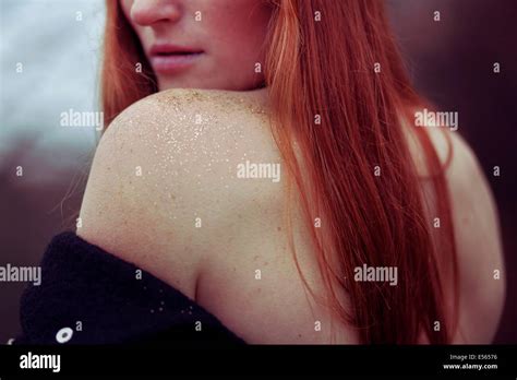 Woman With Long Red Hair And Naked Shoulder Stock Photo Alamy
