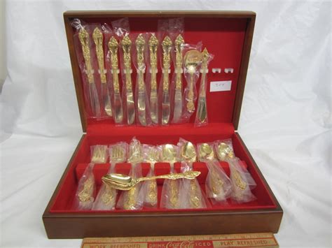 48 PIECE GOLD PLATED CUTLERY SET UNUSED - Schmalz Auctions