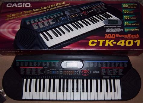 VINTAGE CASIO CTK 401 ELECTRIC KEYBOARD HARDLY USED STILL IN