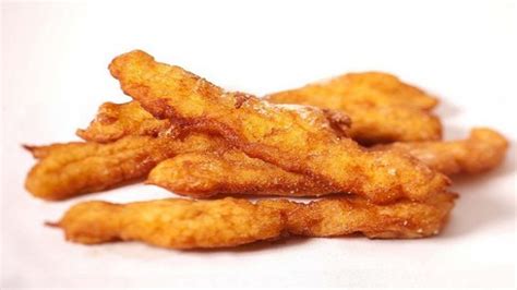 Some Fried Food Sitting On Top Of A White Table