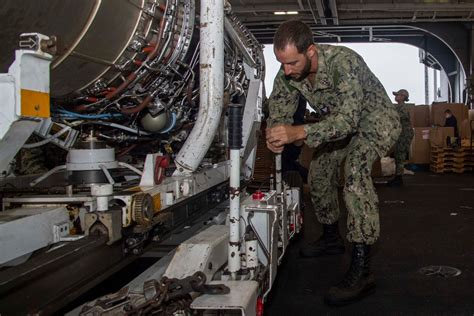 DVIDS Images Sailor Conducts Maintenance On An After Burner Image