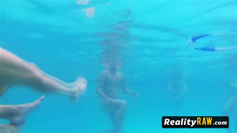 Intimate Oral Sex In The Pool With Other Swinger Couples Around