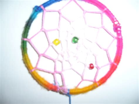 Rainbow Dream Catcher · A Dream Catcher · Decorating And Weaving On