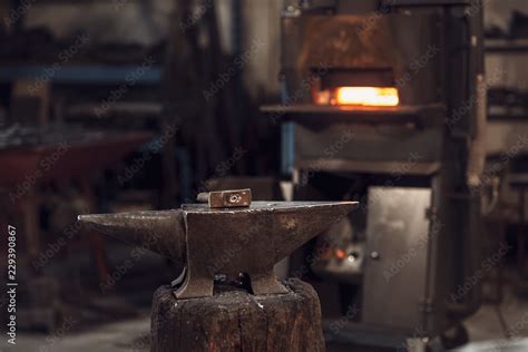 Mallet On An Anvil In Front Of A Furnace Stock Photo Adobe Stock