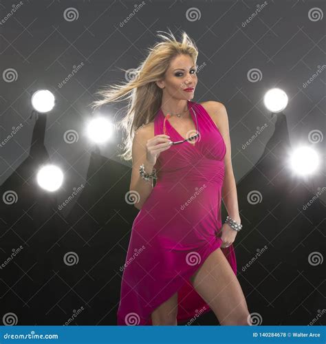 Blonde Figure Model In A Studio Environment Stock Photo Image Of Lights Hair