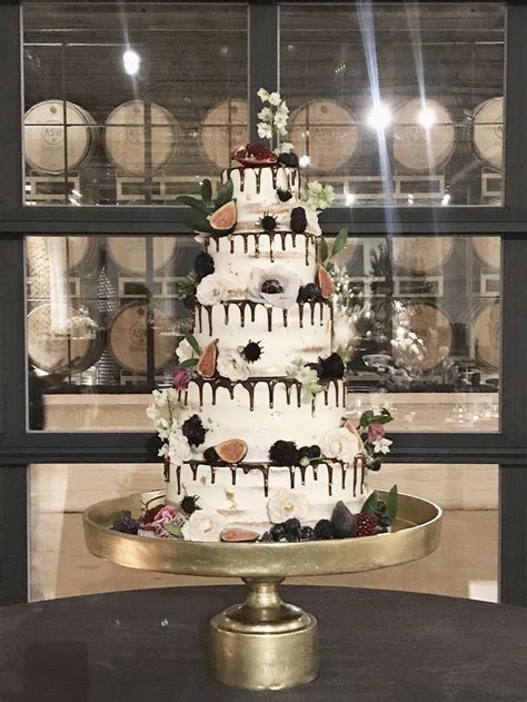 Naked Wedding Cake With Fruit And Chocolate Drips Naked Wedding Cake With Fruit Naked Wedding
