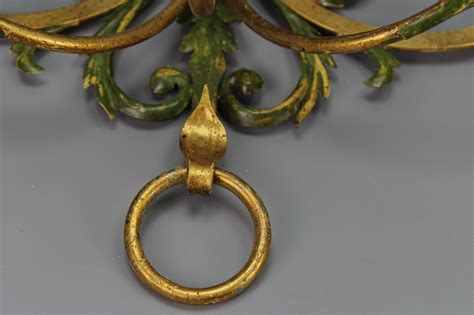 A Pair of Large Gilt and Green Color Metal and Wood Sconces, Italy, ca