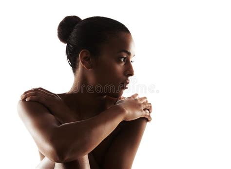 Graceful And Naturally Gorgeous Graceful Nude Woman Posing Against A White Background Stock