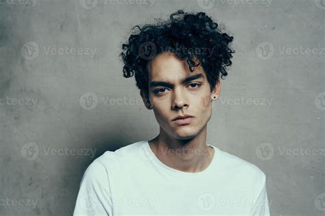 cute guy curly hair emotions studio cropped view 22072861 Stock Photo ...