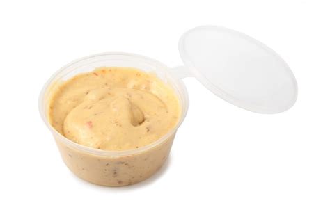 Premium Photo Dip Sauce In A Plastic Take Away Container