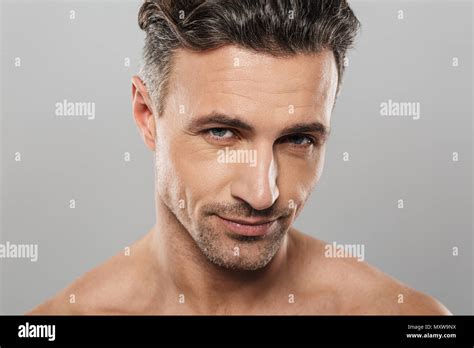 Image Of Handsome Mature Man Standing Isolated Over Grey Wall Background Naked Looking Camera