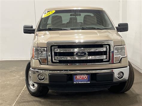 2013 Ford F150 Tan Pickup - The Auto Warehouse