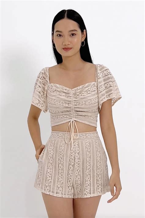 KIMIKO SLANT HEM LACE SHORTS NUDE Lovet