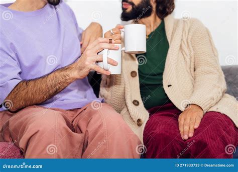 Couple Of Gay Men Relaxing On The Sofa At Home Stock Image Image Of Horizontal Person