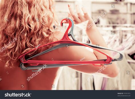Naked Woman Two Empty Clothes Hangers Stock Photo Shutterstock