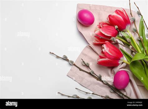 Pussy Willow Branches Painted Easter Eggs And Tulip Flowers On Light Background Stock Photo Alamy