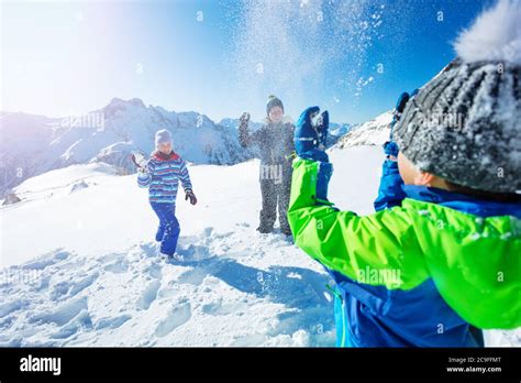 Kids Throwing Snowballs Hi Res Stock Photography And Images Alamy