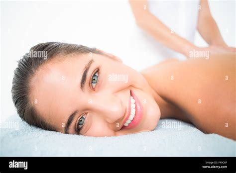 Beautiful Brunette Enjoying A Massage Stock Photo Alamy