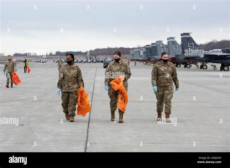 Airmen Assigned To The Rd Wing Conduct A Foreign Object Debris Walk On