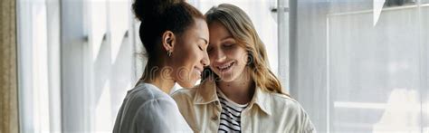 A Lesbian Couple Shares A Tender Stock Photo Image Of Embrace Natural 327460298