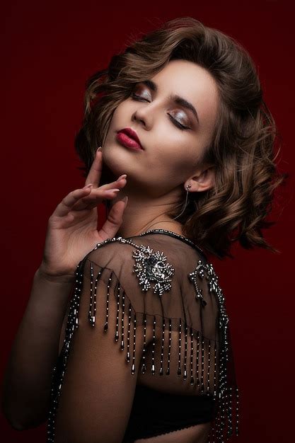 Premium Photo Portrait Of Attractive Brunette Model With Curly Hair And Beautiful Makeup