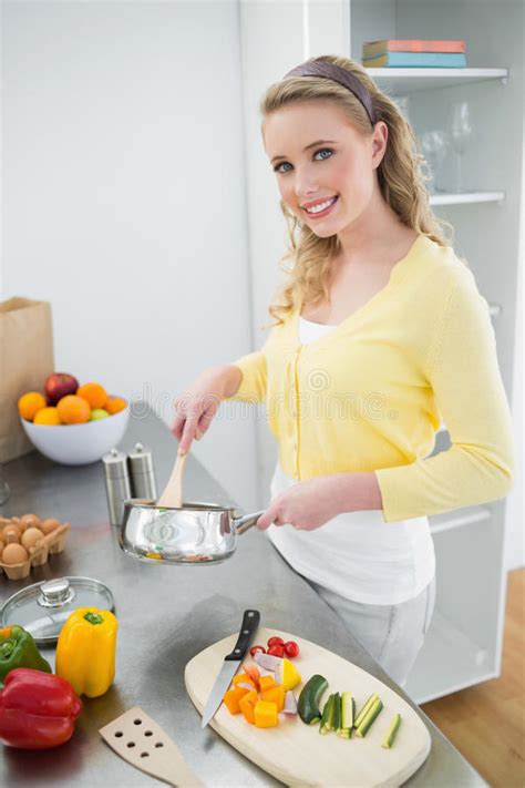 Smiling Cute Blonde Stirring With Wooden Spoon Stock Image Image Of Domicile Worktop