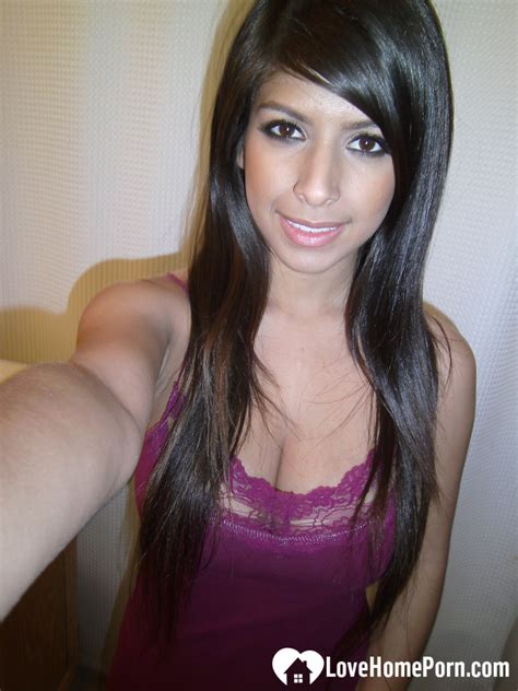 Babe Shows Off Sexy Curves At HomeMoviesTube