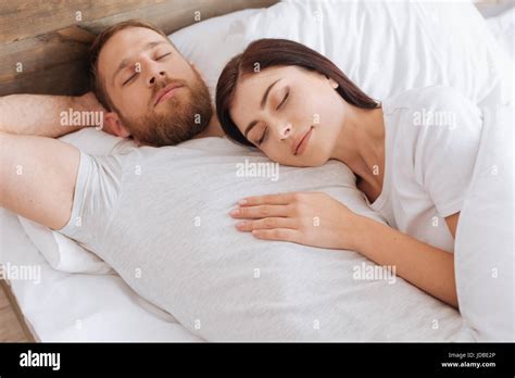 Brunette Of Heavenly Beauty Sleeping On Chest Of Her Man Stock Photo Alamy