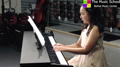Saralyn plays "Down by the Bay" on piano - YouTube