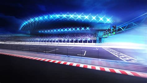 Finish Line Gate Di Arena Balap Dengan Stadion Dalam Buram Gerakan Foto