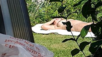 I Spy On My Stepmother She Is Sunbathing Naked In The Yard XNXX