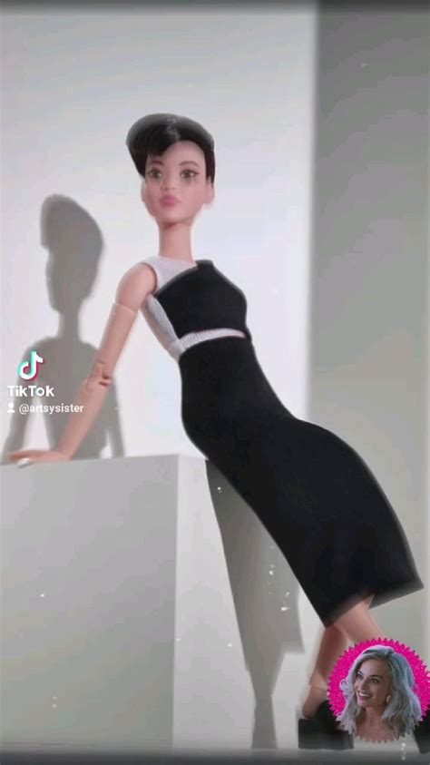 Barbie Signature Looks Doll Petite Brunette Pixie Cut Fully Posable Fashion Doll Wearing