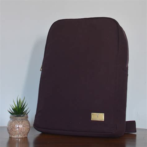 sleek laptop backpack style functionality  purple canvas