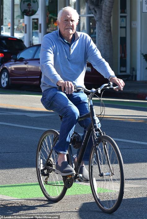 James Bond Star George Lazenby 80 Is Fighting Fit As He Takes A Bike