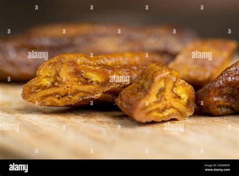 Small Dried Bananas On A Board Dried Fruits Made From Dehydrated But