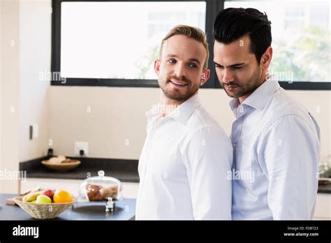 Smiling Gay Couple In The Kitchen Stock Photo Alamy
