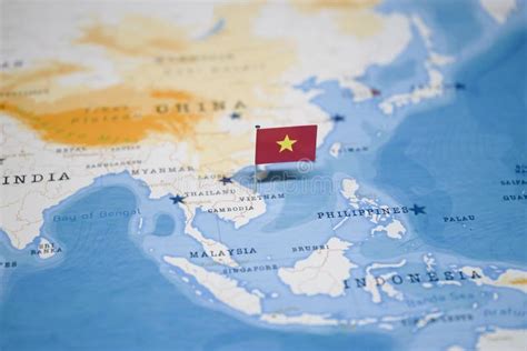 The Flag of Vietnam in the World Map Stock Photo - Image of paper ...