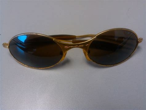 Authentic Oakley E Wire Gen 1 Titantium Sunglasses, Gold frame with ...