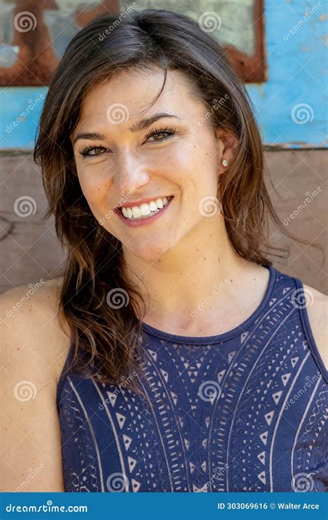 Campus Elegance Brunette Beauty Strikes A Pose Capturing The Essence Of Academic Glamour Stock