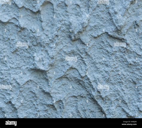 Rough Stucco Textured Background Of Wall With Natural Light Abstract