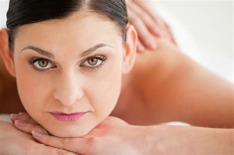 Premium Photo Cute Brunette Enjoying A Massage