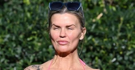 Kerry Katona Unveils New Face And Size Figure In Pink Bikini After