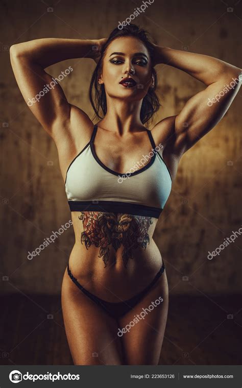 Sexy Strong Brunette Fitness Woman Posing Wall Background Tattoo Body Stock Photo Chaoss