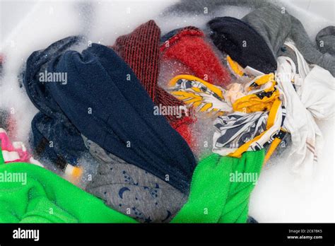 Soaking Color Clothes In Washing Powder Household Chores Stock Photo