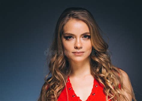Woman In Red Dress With Long Blonde Hair Stock Photo Image Of Lingerie Motion 134300338