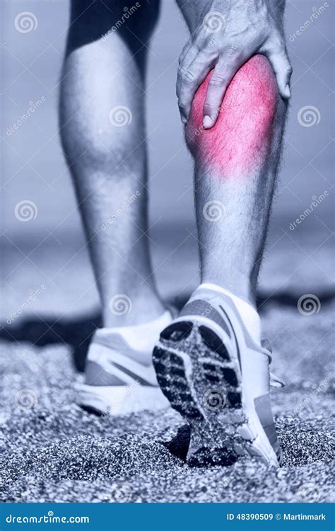 Muscle Injury - Man Running Clutching Calf Muscle Stock Photo - Image ...