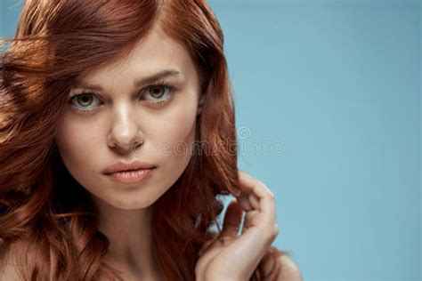 Beautiful Woman Curly Long Hair Smooth Hairstyle Naked Shoulders Cosmetics Care Blue Background