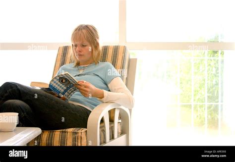 Blonde Lady Reading A Book Stock Photo Alamy