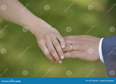 Couple Holding Hands With Wedding Rings Wedding Ideas Never Die